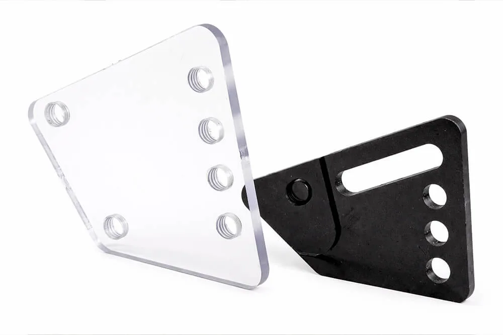 Clear and black flat-cut machine guard component panels with holes and slots